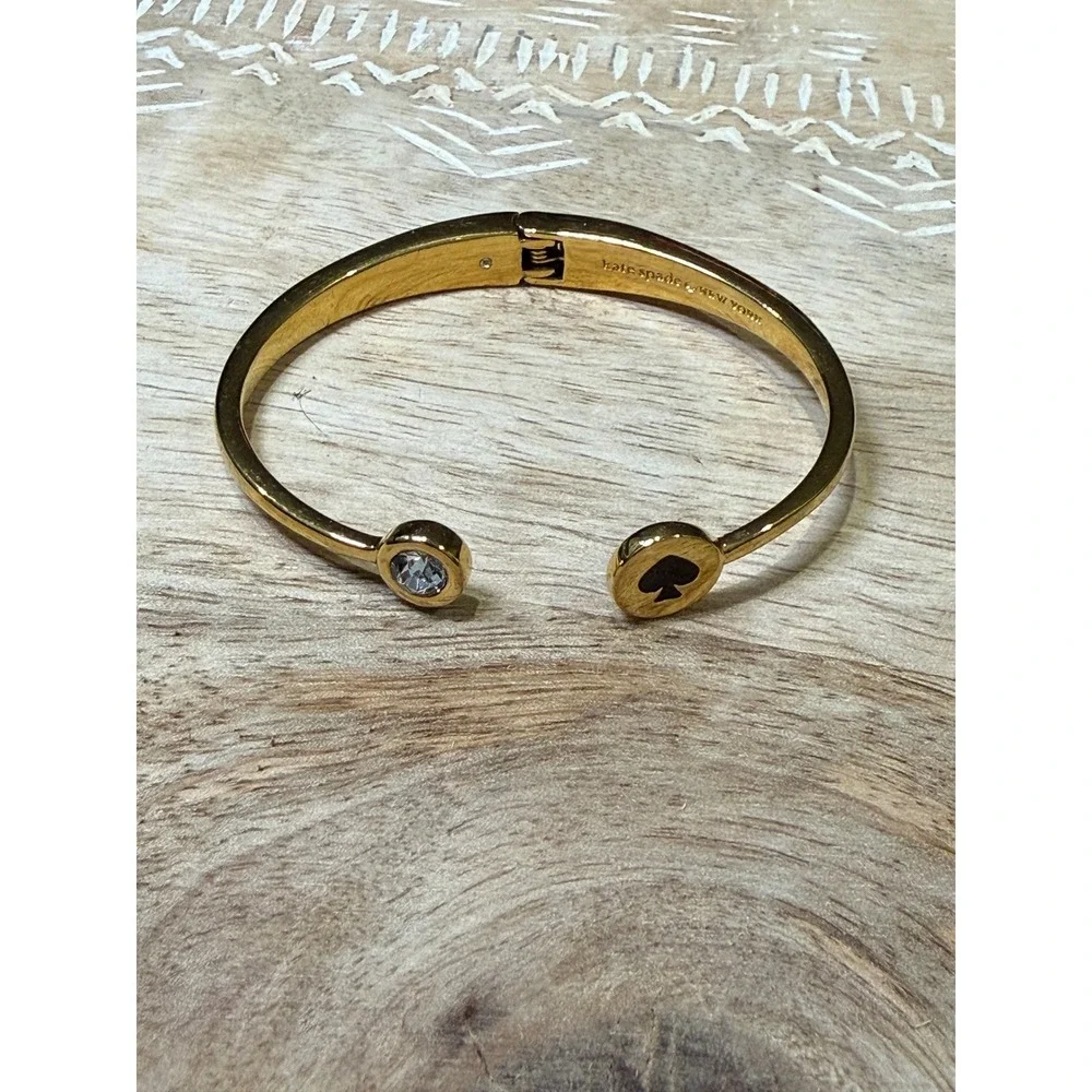 Kate Spade Hinged Cuff Bracelet OS Gold Crystal Spade Logo Preppy Classic - Picture 2 of 3